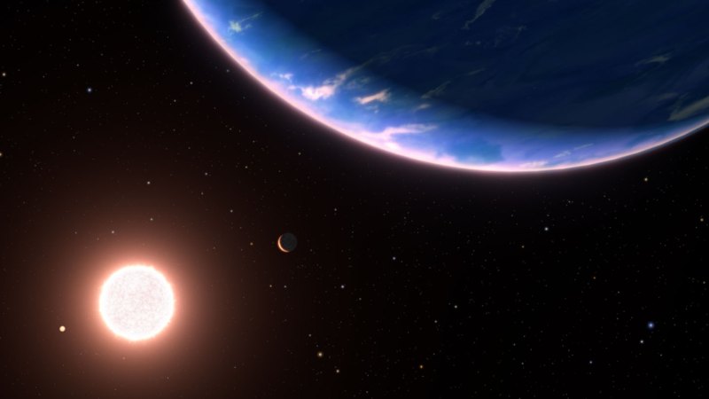 An illustration of a blue, cloudy planet in front of a small red star.